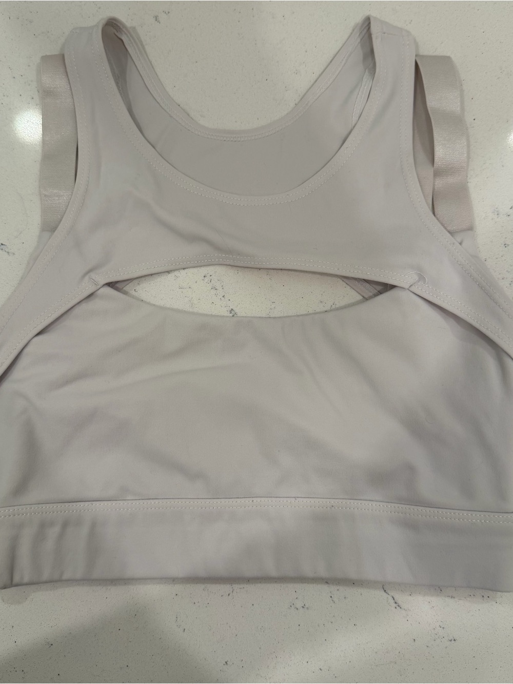 NVGTN Light Beige Cutout Back Sports Bra